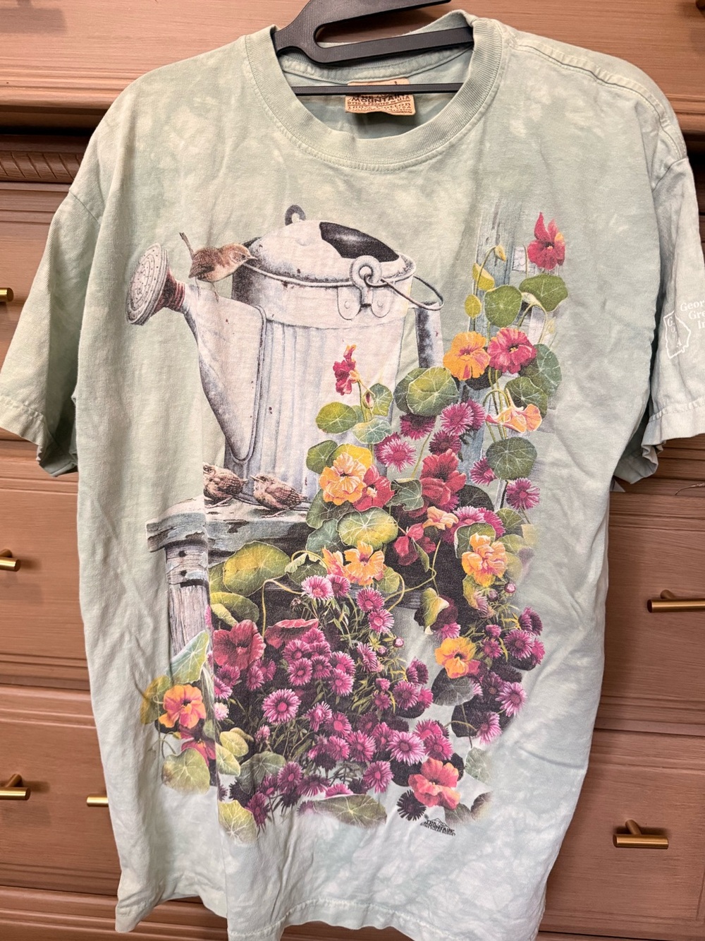 Vintage The Mountain short sleeve Large shirt with Flowers and Watering Can